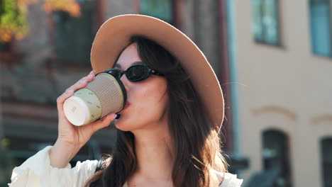 woman enjoying coffee outdoors