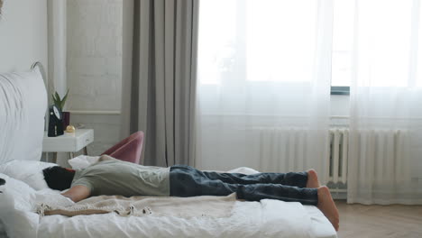 man sleeping in bed