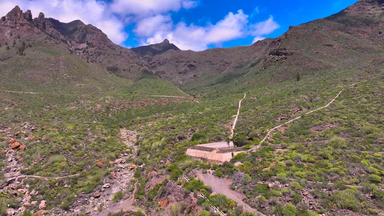 Lush green volcanic terrain with ancient irrigation ditches in the Adeje mountains, Tenerife