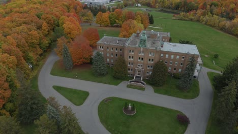 aerial view of a building on a college campus in autumn