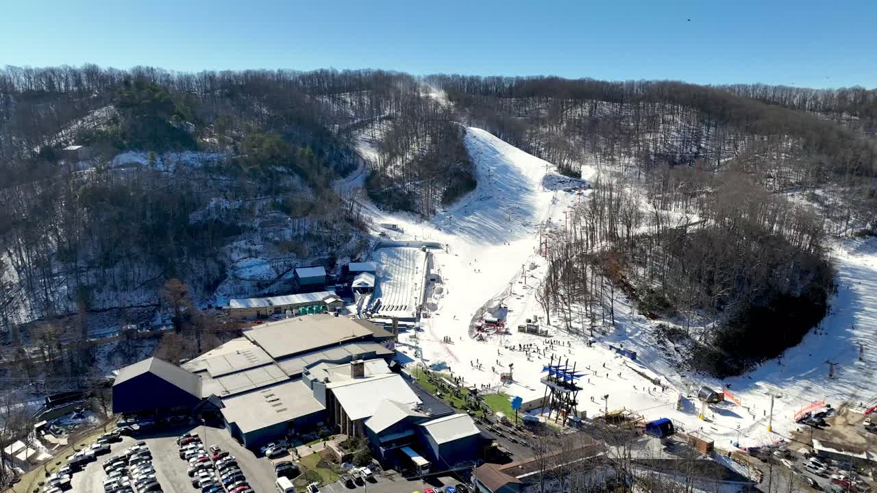 slow aerial push in to ober mountain ski area