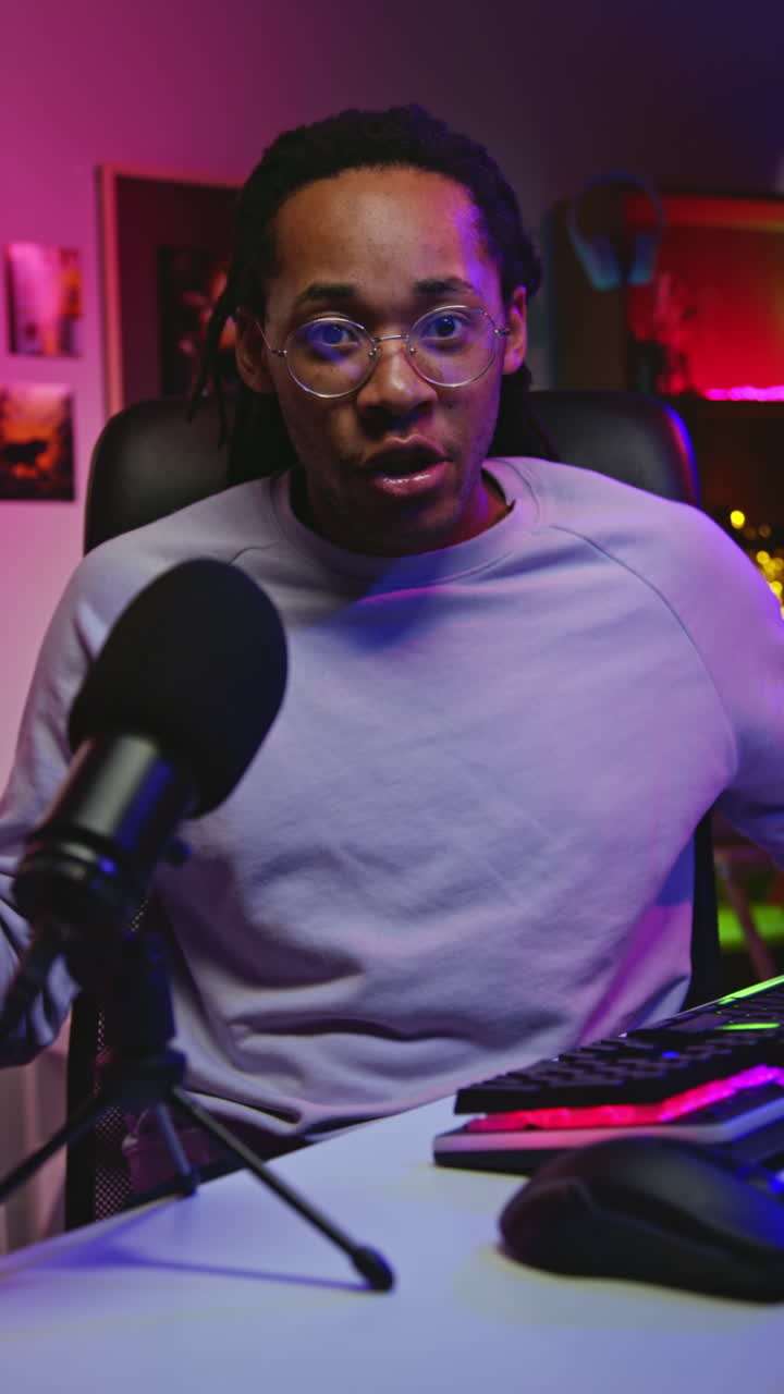A Black Man Recording a Podcast