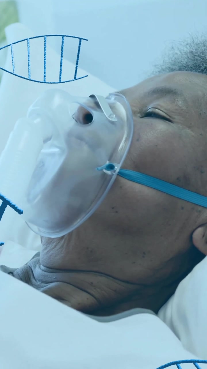 Animazione di filamenti di DNA su paziente donna afroamericana con maschera per l'ossigeno in ospedale