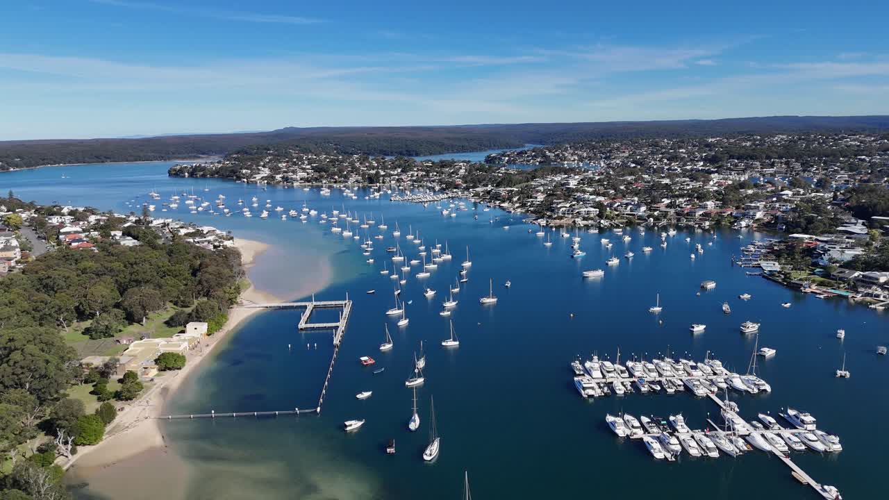 Aerial panoramic of Cronulla’s Gunnamatta Bay showing boats, shoreline and surrounding suburb, Sydney NSW Australia
