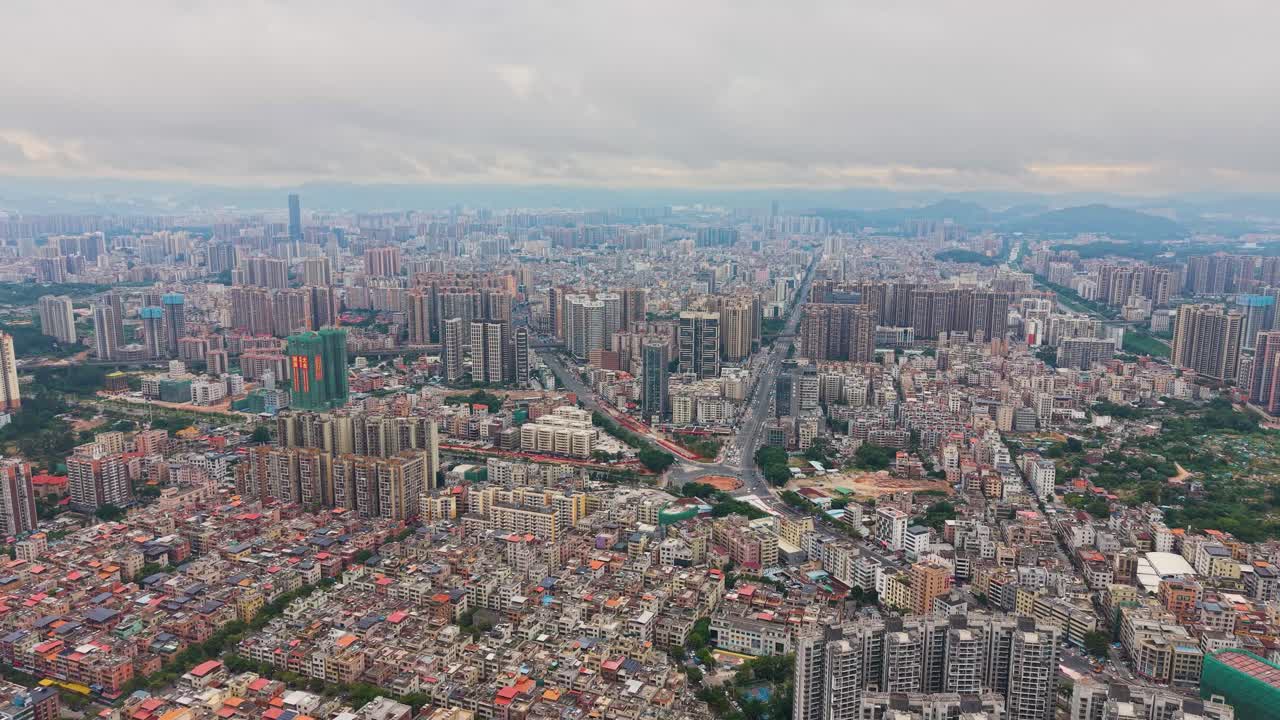 Expansive aerial view of Shenzhen’s Pingshan District, showing dense residential blocks, modern high-rises and urban development in South China