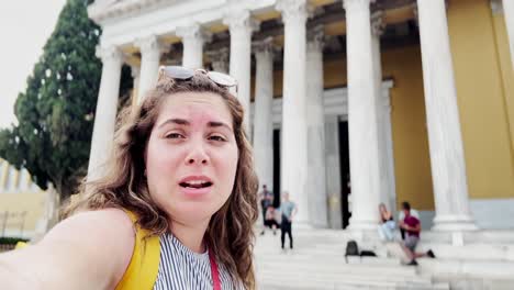 woman vlogging travel experience at zappeion hall athens