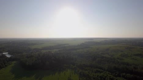 Aerial-landscape-with-forests-fields-and-village-in-Russia