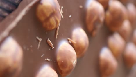 close-up of a chocolate bar with hazelnuts