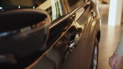 close-up view of a black car in a showroom