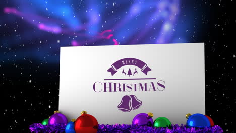 feliz navidad escrito en una pizarra blanca y la nieve cayendo