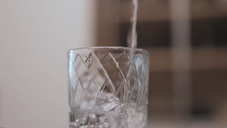 Clean-drinking-water-poured-into-a-glass.