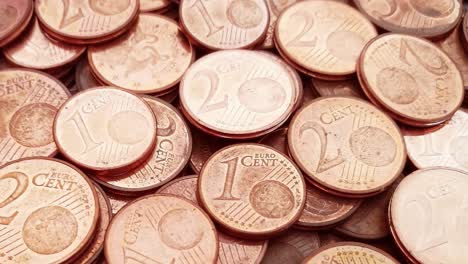 pile of 1 and 2 cents coins close up