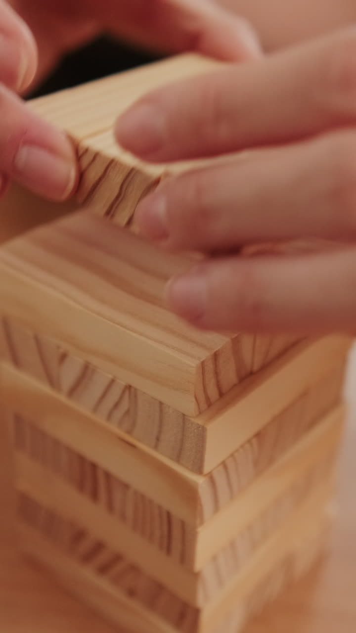Couple Playing Jenga at Home
