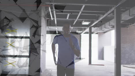 animation of network of connections over man jogging in a abandoned building