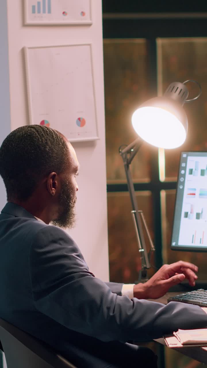 Vertical video Employee checking paperwork details