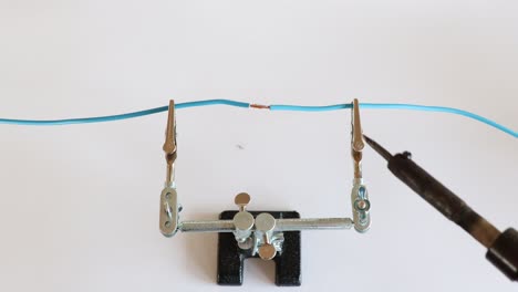 Soldering wires together with an old soldering iron.