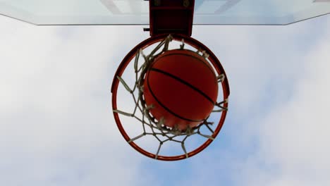 Basketball-going-through-basketball-hoop-4k