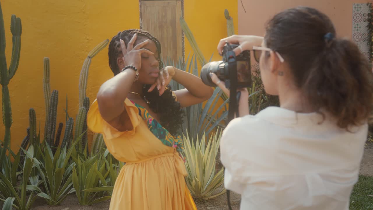 Woman being photographed outdoors