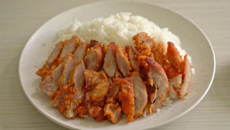 fried pork topped on rice with spicy dipping sauce