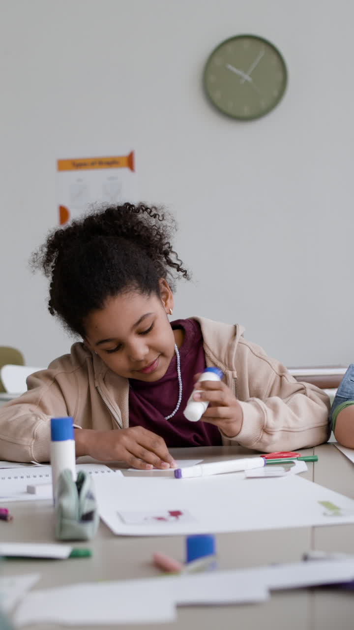 Student Working on a Craft Project in Classroom