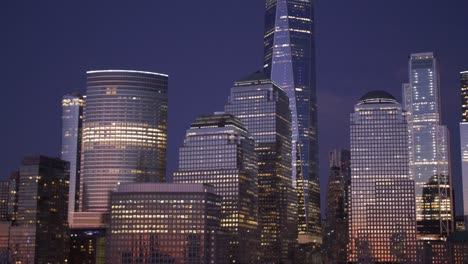 handheld shot of new york skyline at sunset from a boat