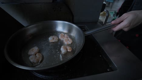 cooking shrimp in a pan