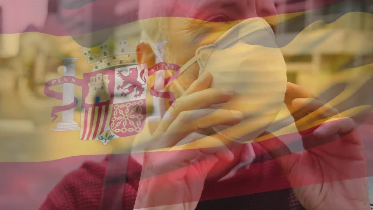 Maskeli bir erkeğin üzerinde dalgalanan İspanya bayrağı animasyonu.
