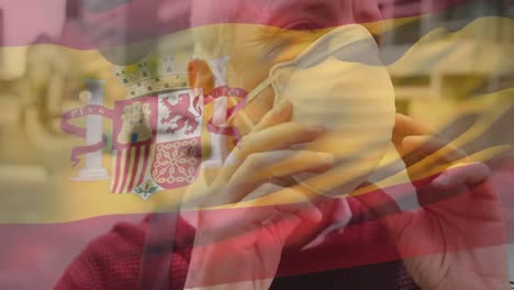 Animation-Der-Flagge-Spaniens,-Die-über-Einem-Mann-Mit-Gesichtsmasken-Weht