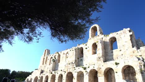 Establishing-view-of-Athens-Acropolis-in-Greece,-ruins-against-blue-sky,-day