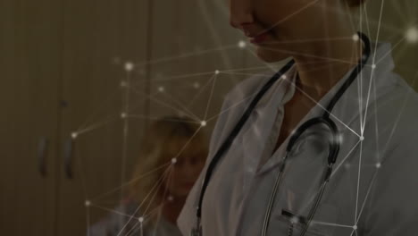 animation of connections over caucasian female doctor in hospital