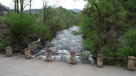 rushing water under bridge.  tennessee mountains