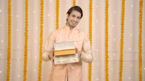 Indian-man-with-sweet-boxes-on-Diwali