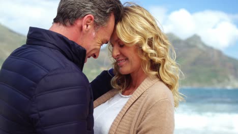 romantic couple embracing face to face
