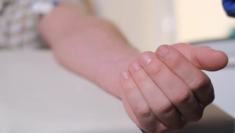 laboratory worker doctor takes a blood sample for analysis, hand closeup. blood sampling in the laboratory. taking a blood in cosmetology clinic before prp therapy procedure. healthcare and beauty concept..