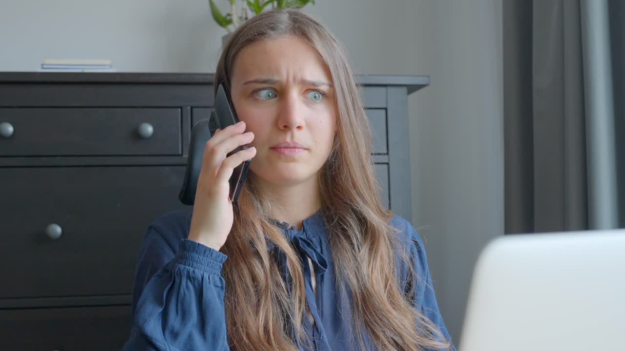 Shocked female manager on a cell phone, Business and technology surprised young woman