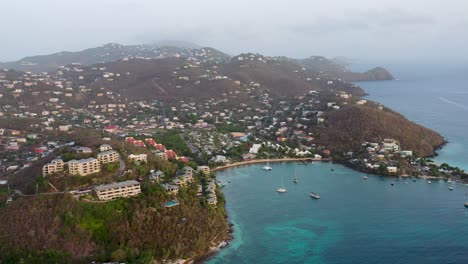 Establishing-Aerial-Shot-of-Breathtaking-Charlotte-Amalie-Coastal-Town-on-Beautiful-Saint-Thomas,-Virgin-Islands