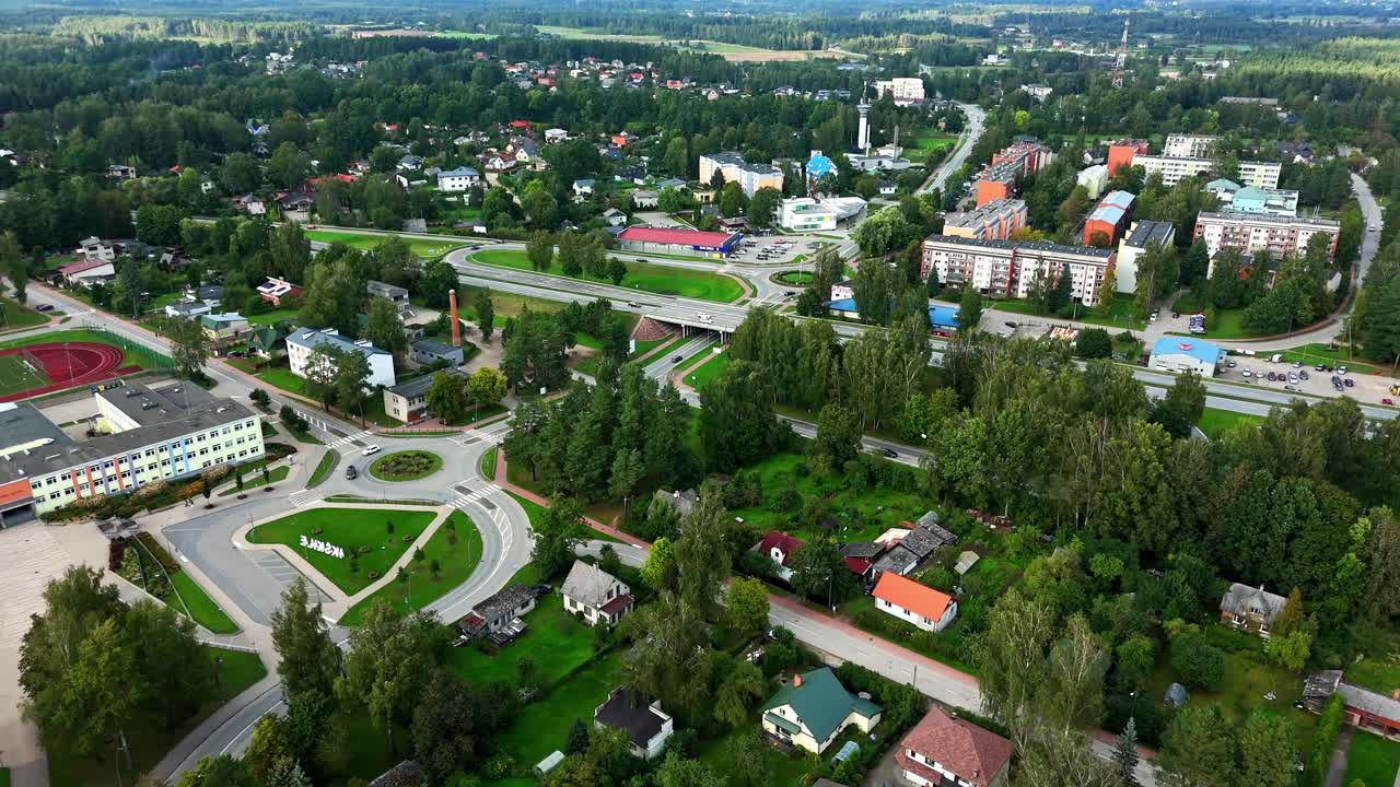 Aerial view showcasing the entire town of Ikskile with its roads and houses