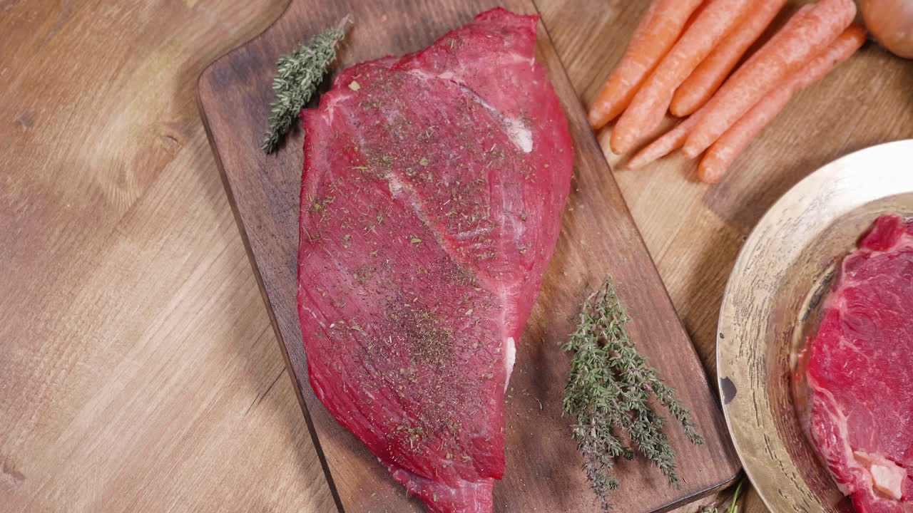 Raw Meat with Vegetables on Wooden Board