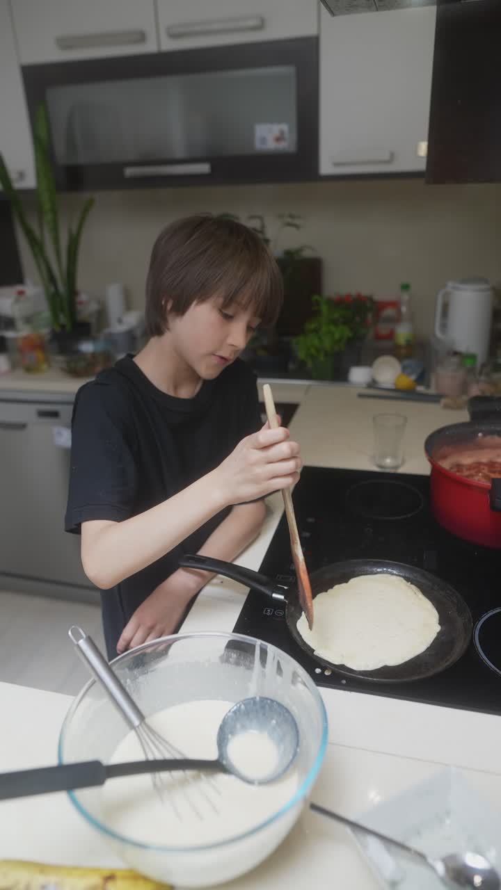 Child Cooking Pancakes