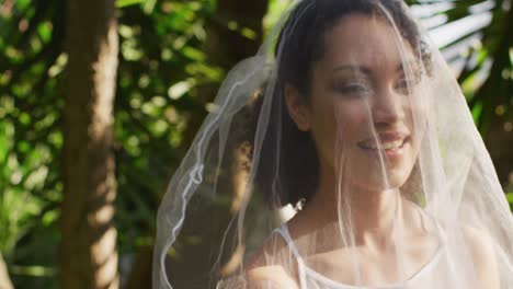 Portrait-of-happy-african-american-woman-wearing-wedding-dress