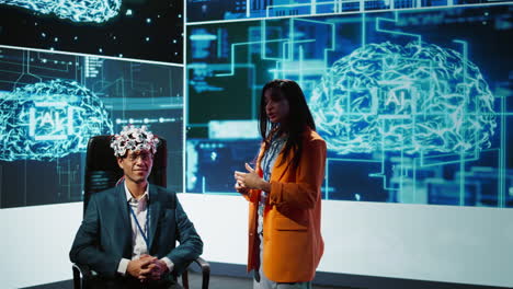 Neuroscientist doing demonstration at AI convention using EEG headset