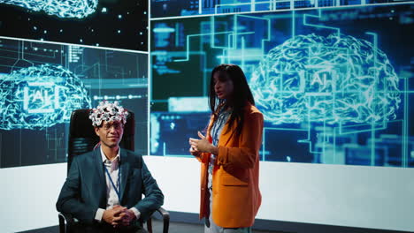 neuroscientist doing demonstration at ai convention using eeg headset