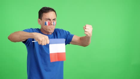 french supporter angry with the decision of the referee