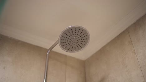 close-up of a modern shower head in a bathroom