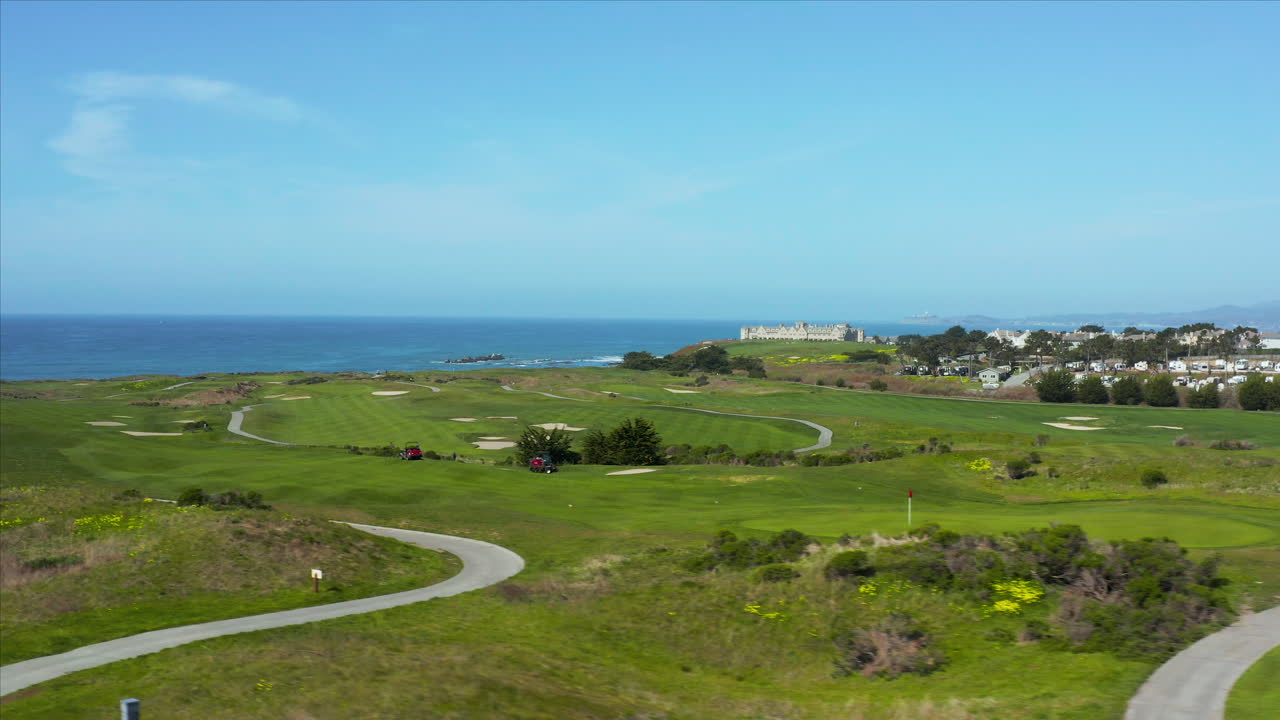 Aerial drone shot of the Ritz Carlton Hotel in Half Moon Bay, California, USA