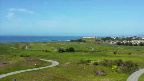 aerial drone shot of the ritz carlton hotel in half moon bay, california, usa