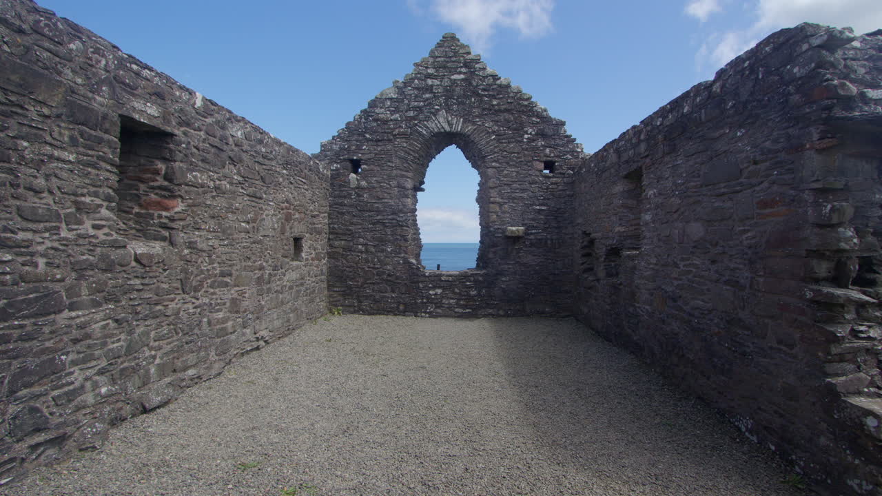 Wide shot looking at the east end window inside of St Ninian’s Chapel, Isle head, Isle of Whithorn