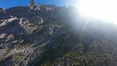 fpv drone flight through italian dolimite alps mountain peaks