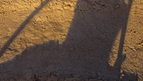 damp soil drying in the sunshine as the water evaporates - time lapse