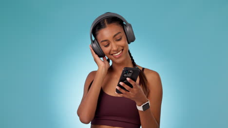 Headphones,-dance-and-woman-on-a-phone-in-a-studio